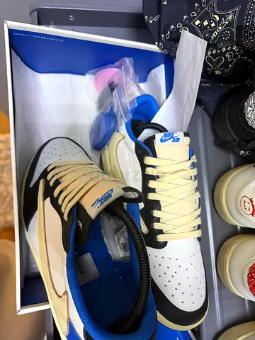 Used Nike low-top sneakers (white/blue) size unknown, good condition