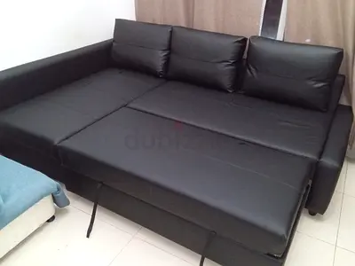 Black leather convertible sofa bed - 3-seater with pull-out bed