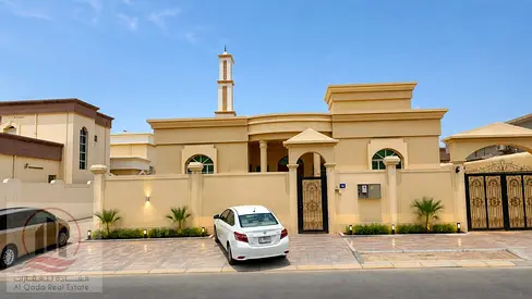 Villa for sale in Ajman, Al Rawda area. 4 master bedrooms, majlis, living room, and maid's room. Fr