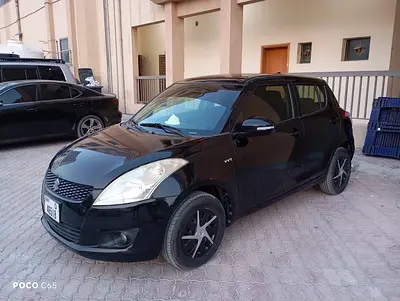 Suzuki Swift GLX 2014 GCC Specs - Reliable and Fuel Efficient Hatchback