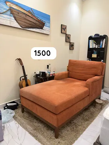 Customised Orange chaise lounge sofa in good condition - high quality heavy wood AED 1,500