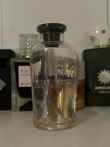 Louis Vuitton Stellar Times empty bottle to refill.