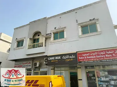 Two-bedroom apartment with a living room and air conditioners in Yarmouk