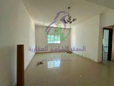 شقة غرفة وصالة للإيجار السنوي في التعاون بإمارة الشارقة بدون تأمين مع شهر مجاني 2 حمام بلكونة تشطيبات حديثة مساحات واسعة
