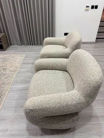 Pair of Modern Curved Bouclé Lounge Chairs - Light Grey