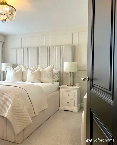 Light grey upholstered bed with tall panelled headboard (good condition)