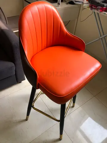 Mid-century style orange dining/desk chair with brass accents, Bar chair, rolling chair 360 deg