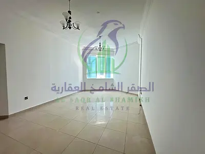 شقه غرفه وصاله للايجارالسنوي فى منطقه الممزر بأمارة الشارقه بمساحه واسعه اطلاله مفتوحه تشطيب حديث موقع مميز قريب من مخرج دبى