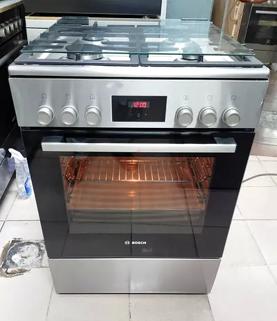 Bosch New model Top Gas + oven Electric Cooker. Never used.. 60×60Cm.
