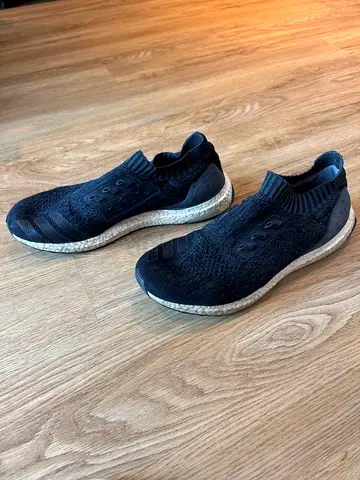 Black knit slip-on running shoes - size unknown, lightly used