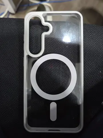 Clear phone case with MagSafe-style ring and camera cutout - gently used samsung s25
