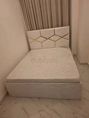 Queen size upholstered bed frame with mattress - like new