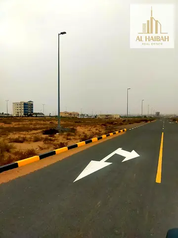 Land for sale in Al Tai Commercial, residential/commercial zone, permit for ground floor + 7 floors, very close to Dubai and the Grand Mosque of Sharj