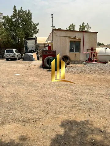 Industrial land for sale in Old Sajaa. Prime location on a 24-meter-wide main road.