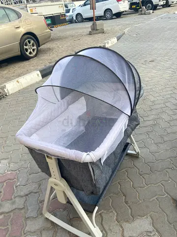 Portable baby bassinet with mosquito net - gently used