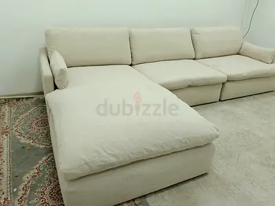 Perfect condition home center feather 🪶 filled modular sofa with ottoman