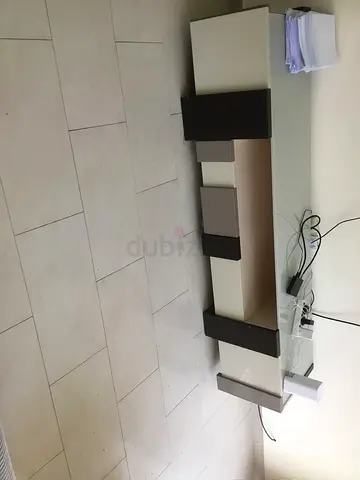 Low modern TV unit / entertainment center - beige and dark brown