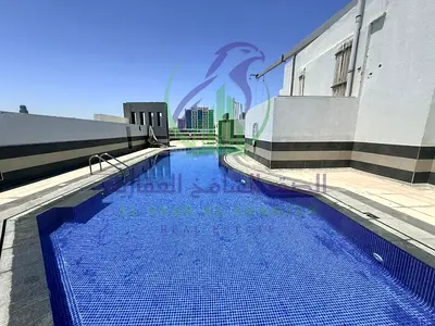 Three bedroom apartment with a living room for annual rent in Al Majaz 2 Sharjah Free gym Free parking Free swimming pool Built in wardrobes Two balco