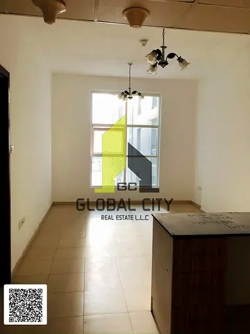 شقة غرفة وصالة للإيجار في سيتي تاور – عجمان | 757 قدم مربع | موقف سيارات شامل | 30,000 درهم سنوياً