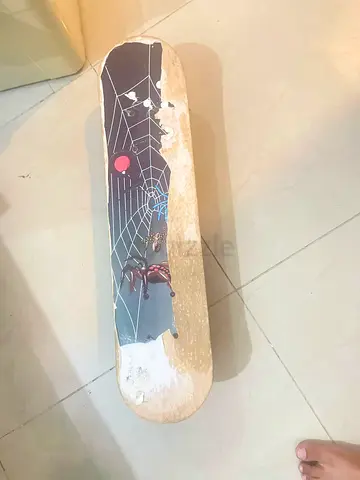 Used Spider web  skateboard