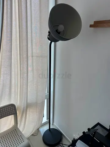 Simple gray floor lamp with adjustable head