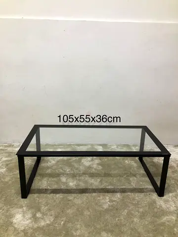 Black coffee table with glass top