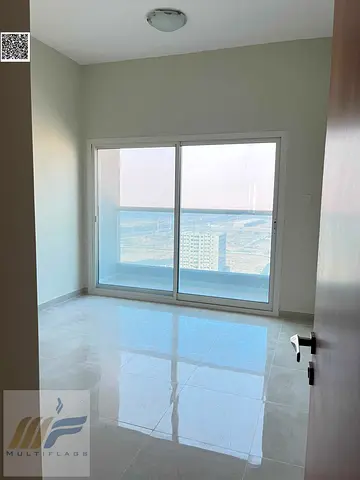 Two-bedroom apartment for sale in Golf Tower, Ajman | Total price AED 560,000 | Installment plan available