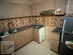 Two-bedroom apartment for sale in Golf Tower, Ajman | Total price AED 560,000 | Installment plan ava