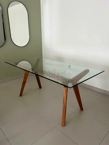 Crate & Barrel glass dining table