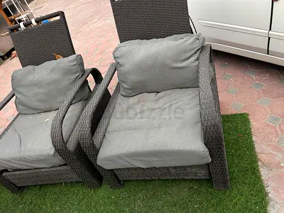 Pair of outdoor rattan armchairs recliners with cushions — good used condition