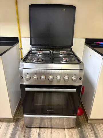 Stainless Steel 4-Burner Gas Cooker with Oven - Good Condition AL JADDAF- 200 DH