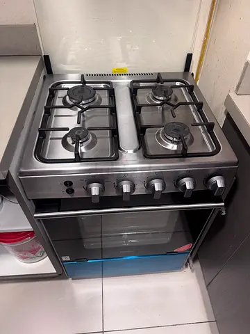Used 4-Burner Stainless Steel Gas Cooker with Oven - Good Condition