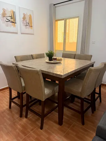 Solid Wood Dining Table with 8  Upholstered Chairs - Good Condition