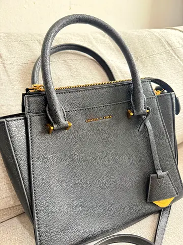 Charlise and Katie black leather handbag with gold hardware