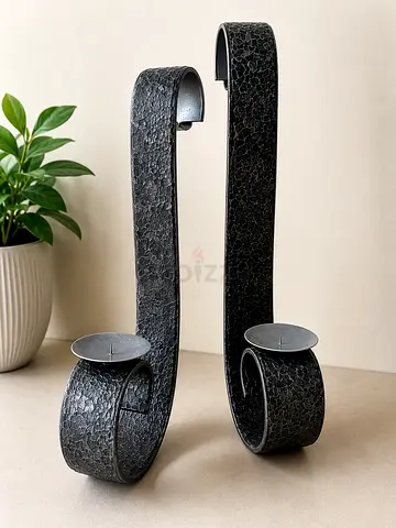 Pair of black textured metal wall candle holders (set of 2)