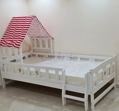 Bed with mattresses