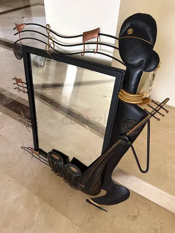 Decorative African-style Metal Mirror with Sculptural Accents