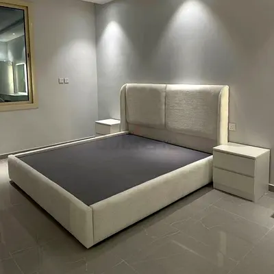 King-size upholstered bed frame with headboard