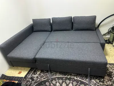 Grey fabric L-shape sofa bed