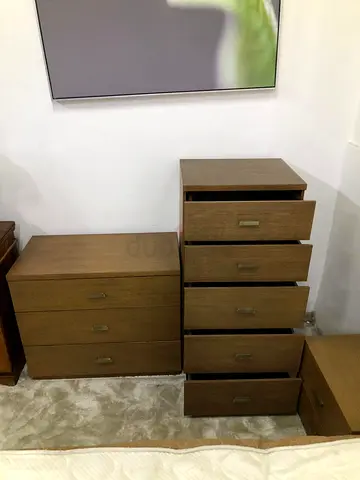 Chest of drawer with two sides tables