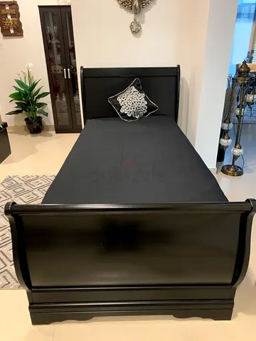Single black wooden bed, night stand & a study table