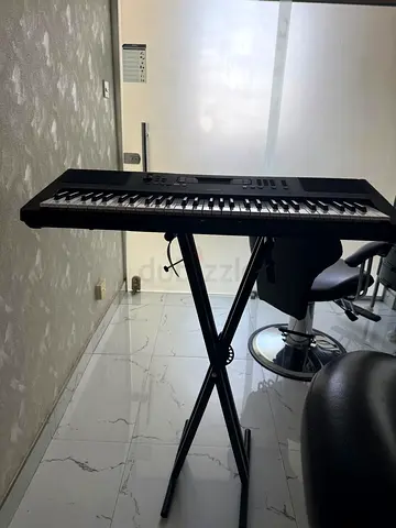 Yamaha portable digital keyboard with stand - good condition