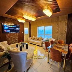 Luxury two-bedroom apartment with a living room in Ajman - Al Rashidiya 1 - Orient Towers - furnishe
