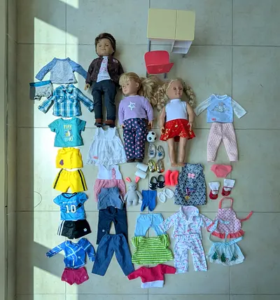 American Girl dolls with many outfits and accessories