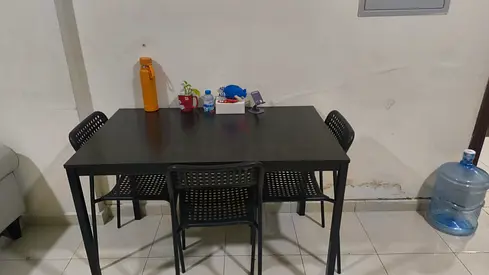 Black colour wooden dining table with 4 chairs