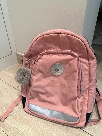 Pink Kipling Backpack with Pompom Keychain