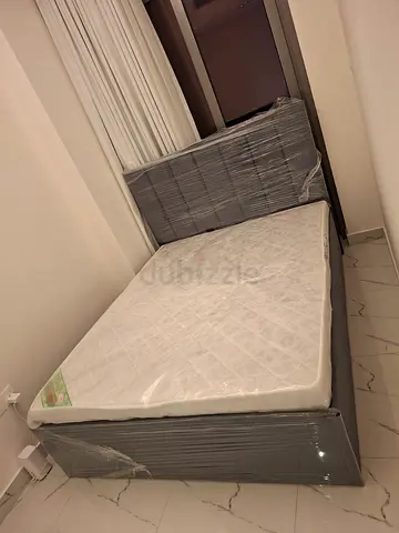 Single mattress with base - good condition, wrapped