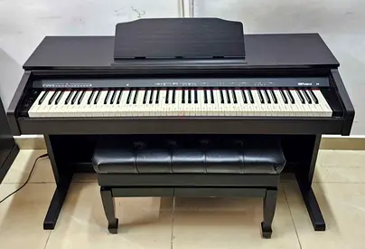 The Roland RP30 is a budget-friendly 88-key digital console piano designed for beginners and student