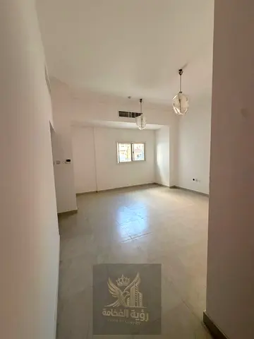 One-bedroom apartment with a living room available for rent in Al Butina; first-time occupancy. Features a spacious layout and modern