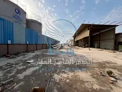 Industrial yard for rent, 20,000 sq. ft. in Sajaa. Includes 6 workers’ rooms, 6 bathrooms, kitchen